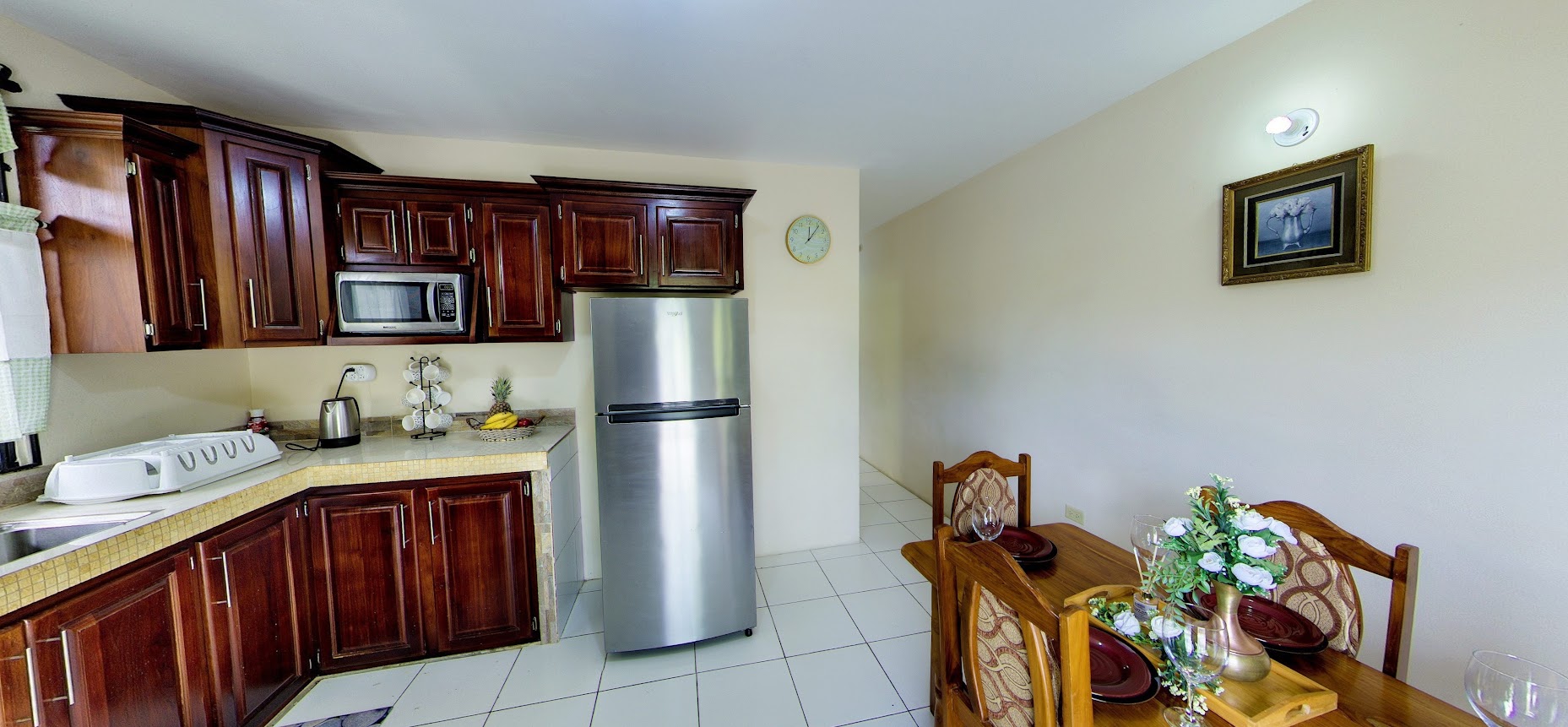 Full kitchen with dining table set for two